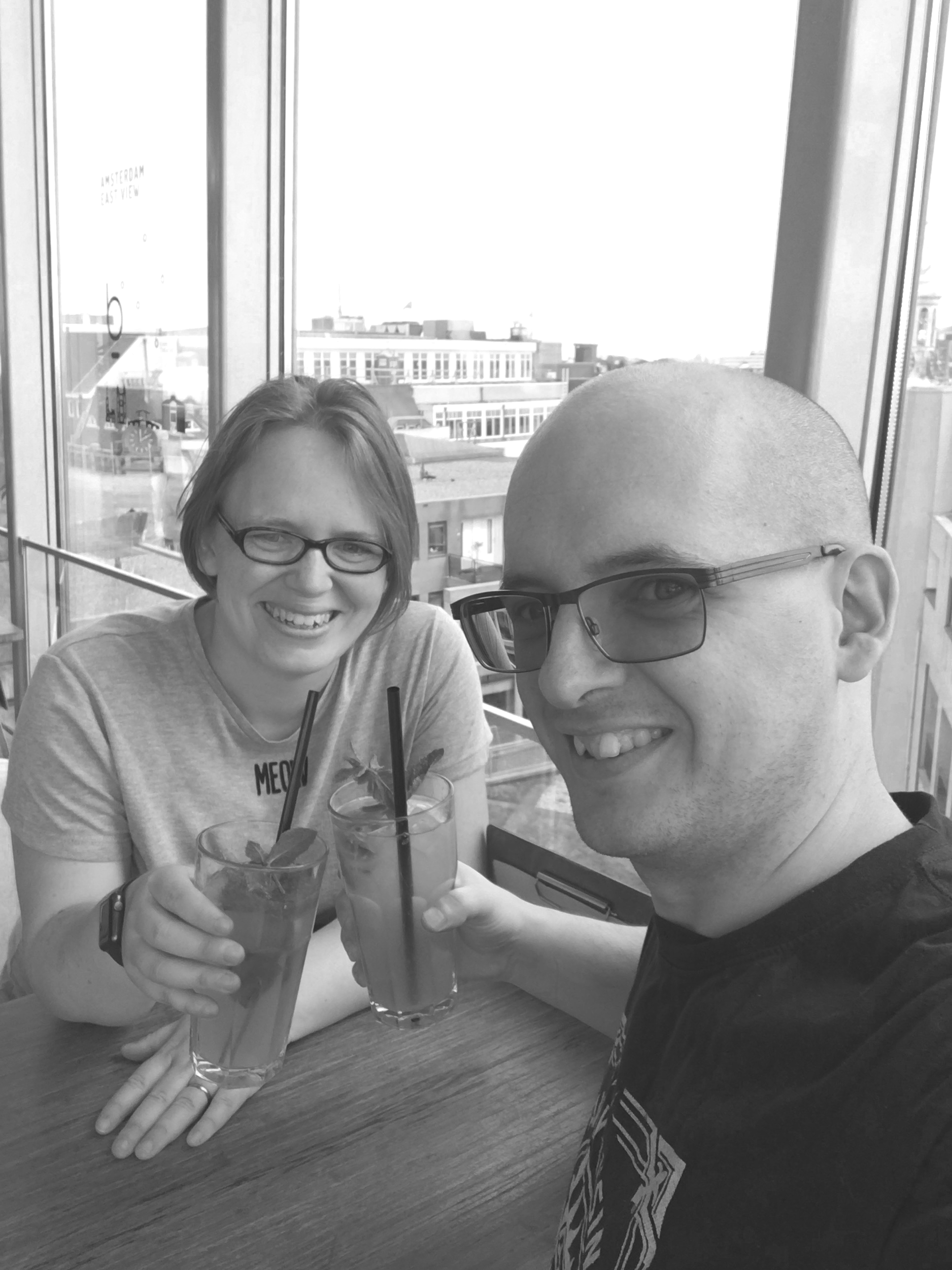 Benjie and Jem clink glasses full of lemonade